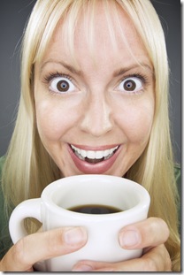 Beautiful Woman Enjoys Coffee